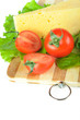 Arrangement with tomatoes and cheese on Cutting board