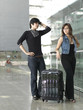 Asian Chinese couple confused over their flight arrangement Asian Chinese couple confused over their flight arrangement