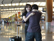 Asian Chinese girl greeted by boyfriend at the airport Asian Chinese girl greeted by boyfriend at the airport