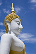 buddha statue in thai temple on nice blue sky buddha statue in thai temple on nice blue sky
