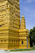 gold thai temple and blue sky gold thai temple and blue sky