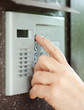 Close-up of  using  intercom