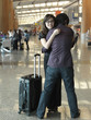 Asian couples meeting and greeting at the airport Asian couples meeting and greeting at the airport