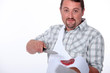 Butcher offering a piece of steak