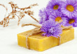 Body care, natural herbal soap and flowers