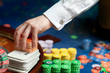 hand of a poker dealer