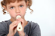 little girl playing flute