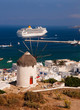 Top view of Mykonos, windmill and old port with cruise ship