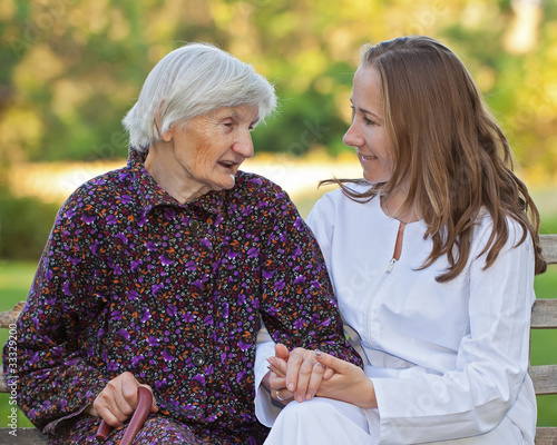 Photo: Elderly woman with the young doctor Elderly woman with the young doctor
