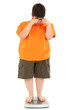 Photo: Morbidly Obese Fat Child on Scale Morbidly Obese Fat Child on Scale