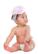 Baby girl holding her toes
