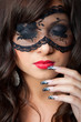 Foto: sensual brunette girl with lacy mask on her eyes sensual brunette girl with lacy mask on her eyes