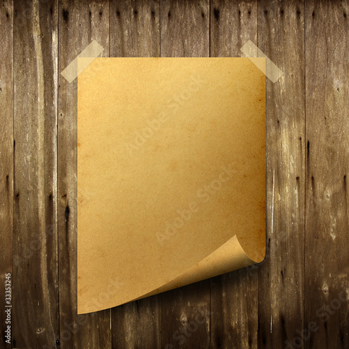 Photo: Poster old paper. Stick tape on old wood background. Poster old paper. Stick tape on old wood background.