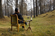 man sitting on the chair drinking wine