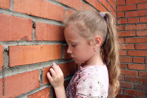 Photo: girl against the wall girl against the wall