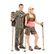 Portrait of a man and woman in sportswear with backpacks