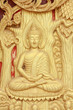 golden buddha on the wall in thai temple golden buddha on the wall in thai temple