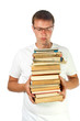 Young student  holding stack of books