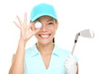 Golf ball woman holding club