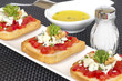 Appetizers with tomatoes and cheese decorated with parsley