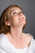 Beautiful woman looking up