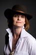 smiling mature woman a cowboy hat