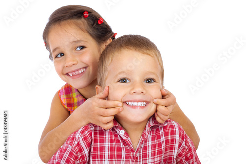 Photo: Two funny smiling little children Two funny smiling little children
