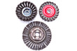 set of three rotating metal brushes