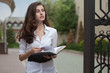Photo: Young businesswoman looking right Young businesswoman looking right