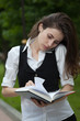 Photo: Busy woman serching ing notebook Busy woman serching ing notebook