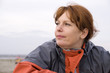 Foto: woman on the beach in the autumn woman on the beach in the autumn