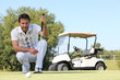 Man playing golf