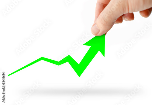 Photo: Hand rising green business graph Hand rising green business graph