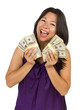 Excited Multiethnic Woman Holding Hundreds of Dollars
