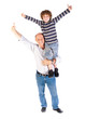 Foto: Grandfather giving grandson piggy-back Grandfather giving grandson piggy-back