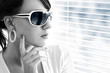 Photo: Young woman wearing sunglasses Young woman wearing sunglasses