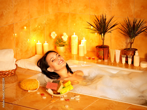 Photo: Woman take bubble bath. Woman take bubble bath.
