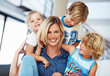 Middle aged woman having good time with kids Middle aged woman having good time with kids