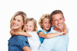Couple smiling with son and daughter