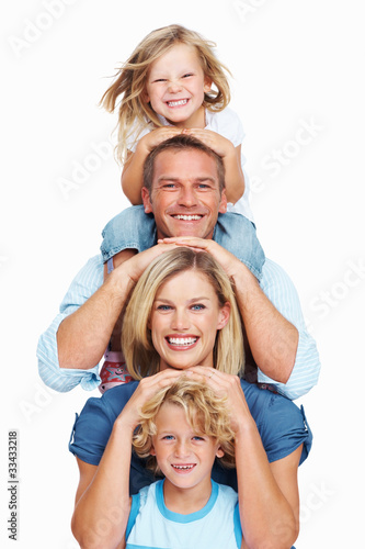 Photo: Happy family smiling together Happy family smiling together
