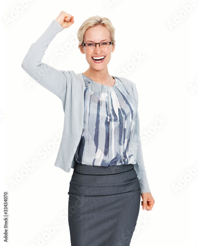 Photo: Successful business woman celebrating Successful business woman celebrating