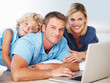 Family using laptop