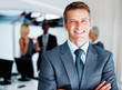 Male executive with colleagues