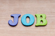 Employment concept with letters on background