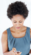 Smiling woman using text messages