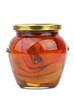 Glass jar with conserved red bell peppers Glass jar with conserved red bell peppers