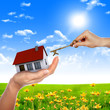 hands holding house hands holding house