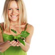 plant in blonde hands
