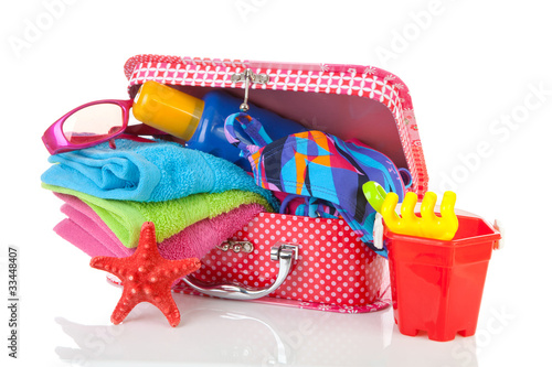 Photo: Going on vacation over white background Going on vacation over white background