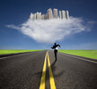 businessman running to the future city with his shadow